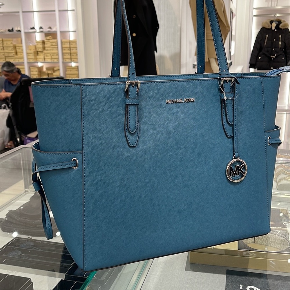 Michael Kors Gilly Large Drawstring Travel Leather Top Zip Tote
 Color: TEAL
NWT - Picture 14 of 16